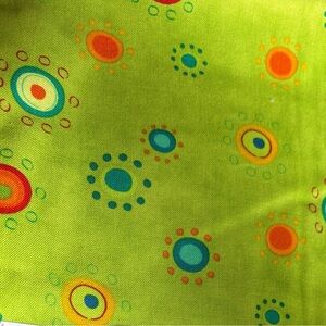 Robert Kaufman Fabric “Quilts for Kids” Circle Designs Fabric- 1/2 yard cut